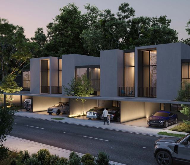 Townhouses at Masaar 3 at dusk.
