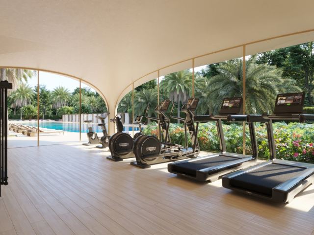 The fitness studio at Ocean House, open to the pool and the gardens.