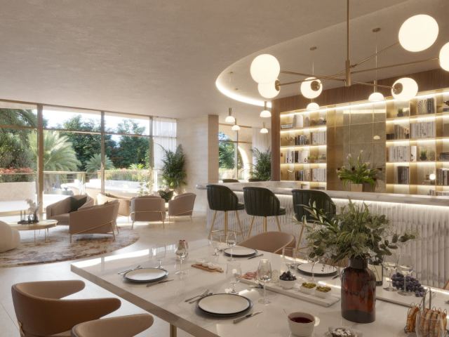 The Clubhouse at Ocean House, with a communal dining table and a lounge.