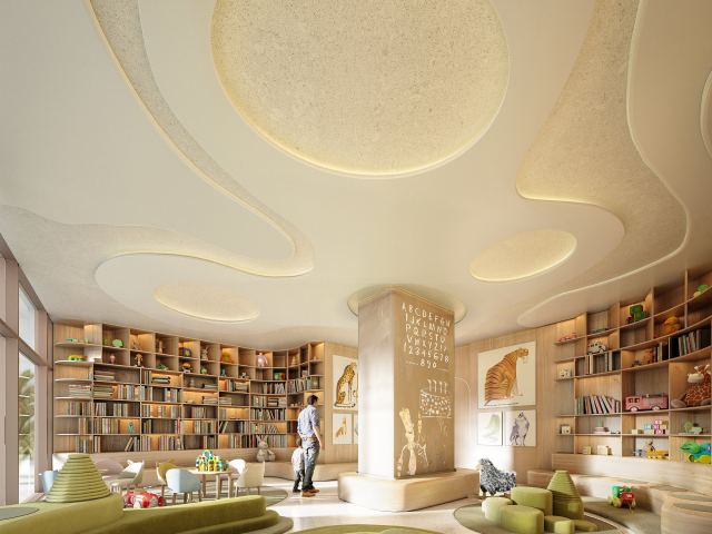 The children's play area at Ocean House, with shelves of books and soft seating.