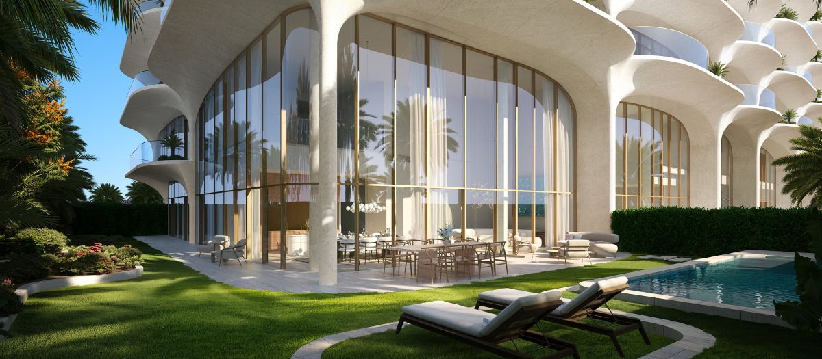 A ground-floor duplex at Ocean House, with its private pool and garden below the curved balconies.