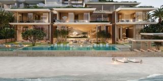 The Mansion at ORLA by SAOTA, with its pool veranda stepping onto the beach.