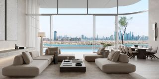 A living room at ORLA looking across Palm Jumeirah to the skyline.