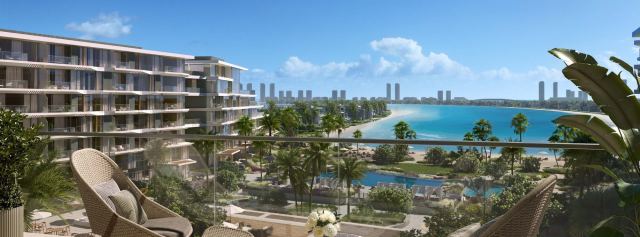 View from a Palm Central terrace over the amenity deck, the pools and the beach.