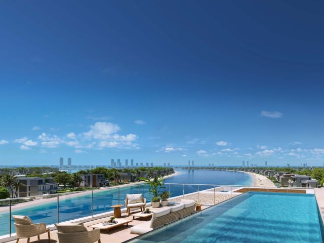 Bedroom at Palm Central opening to the sea.