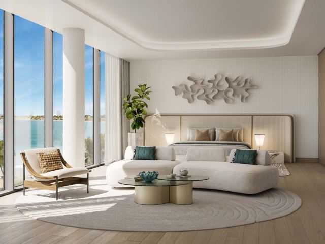 Double-height dining room in a penthouse at Palm Central.