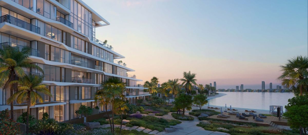 Palm Central at sunset, the terraces stepping back above the beach.