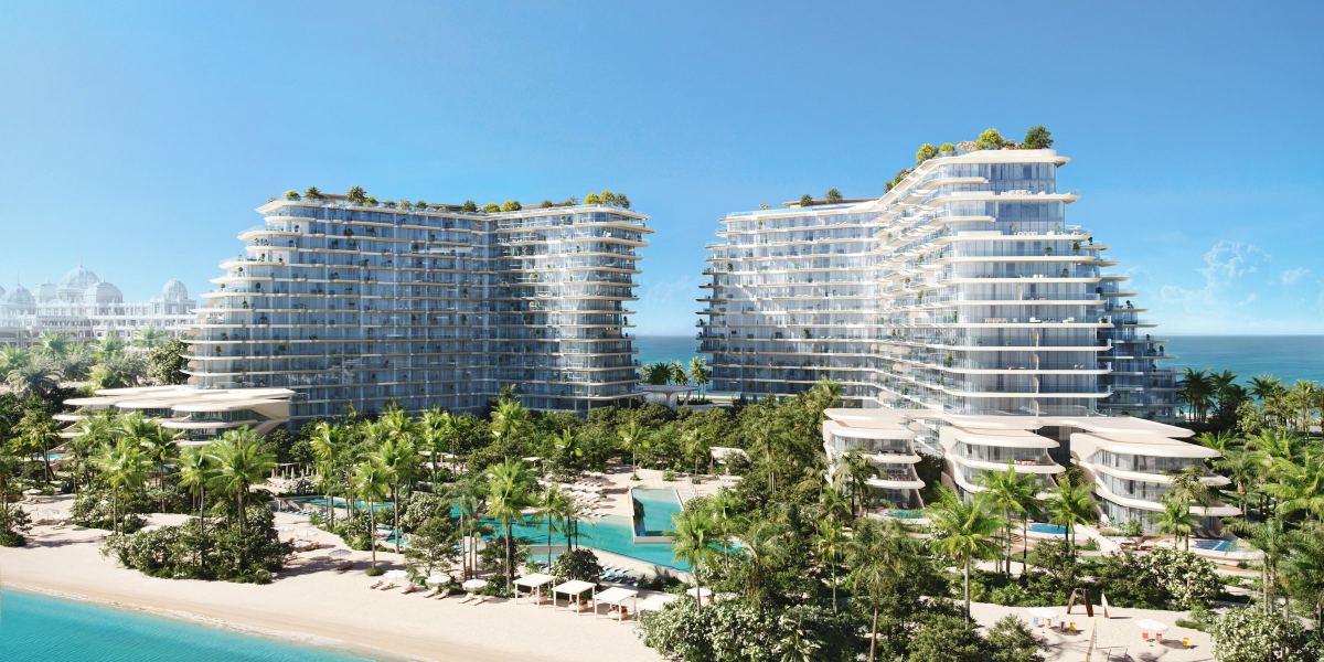The twin towers of Passo by Beyond on the West Crescent of Palm Jumeirah, above the beach and the gardens.