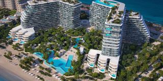 An aerial view of Passo: the two towers, the pools, the gardens and the beach on the Crescent.