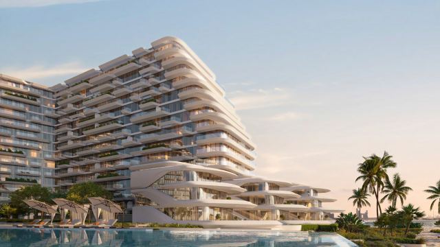 Terraced residences above a pool on the Palm Jumeirah crescent
