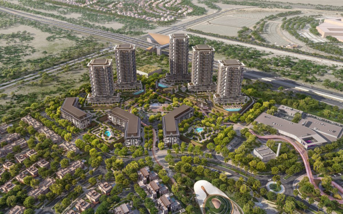 Rise by Athlon towers and low-rise buildings seen across the Athlon community from the air.