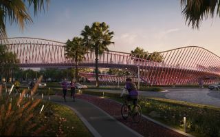 The red cycling and running bridge over the Athlon parkland.