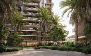 Planted balconies on a Rise by Athlon tower behind mature palms.