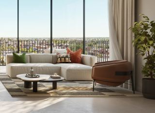 Living room in a Rise by Athlon apartment with full-height windows over the community.