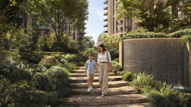 A family on the garden walk between the towers at Sei Saadiyat