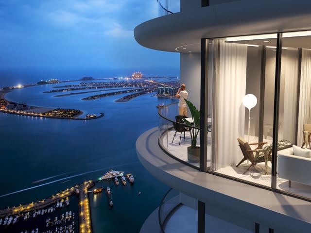 Palm Jumeirah at night from a balcony at Sobha Seahaven.