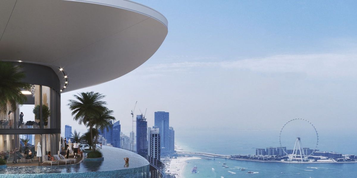 The infinity pool deck at Sobha Seahaven, with JBR Beach and Ain Dubai beyond.