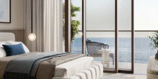 A bedroom at Soulever looking out to the sea.