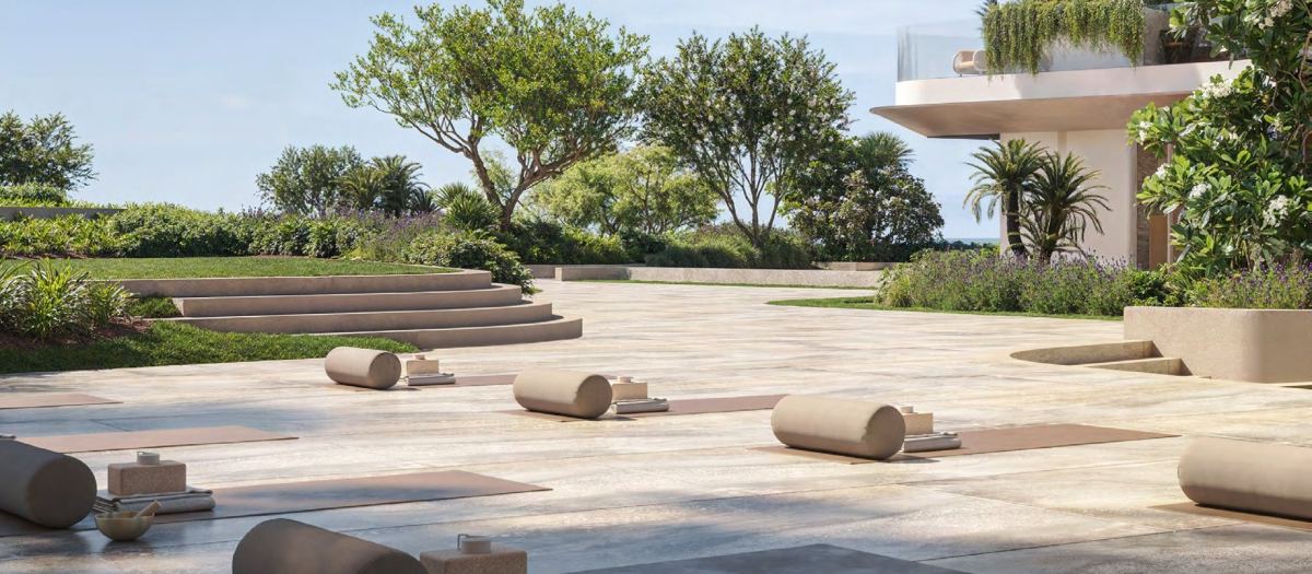 The outdoor yoga deck in the gardens at Soulever, beside the sea.