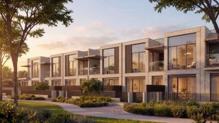 Row of single-row garden villas at The Terraces, Sobha City Abu Dhabi, with elevated terraces and private backyards at sunset.