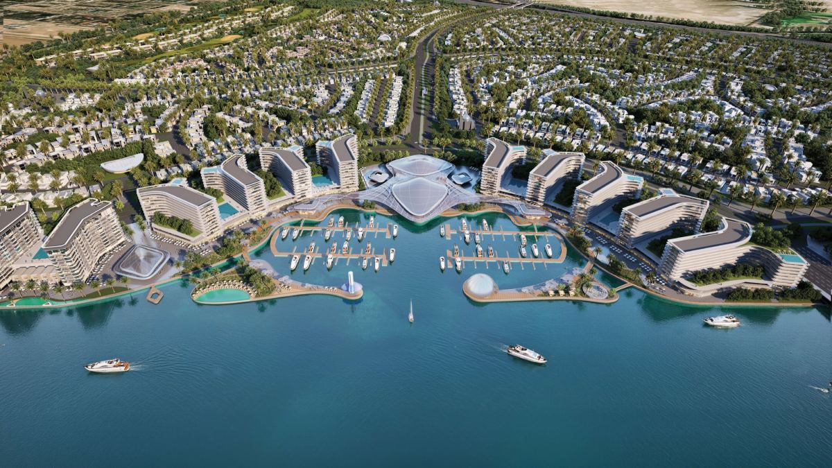 Aerial view of the Sobha City Abu Dhabi master plan in Al Bahia, showing the marina, canal, waterfront residences and villa districts.