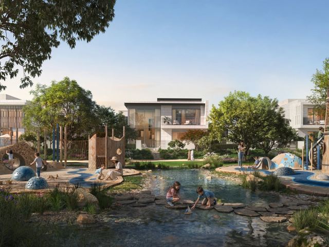 A children's play area with a shallow water garden at Talay.