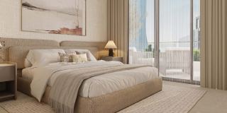 Bedroom with full-height glazing at Vida Residences Saadiyat Island