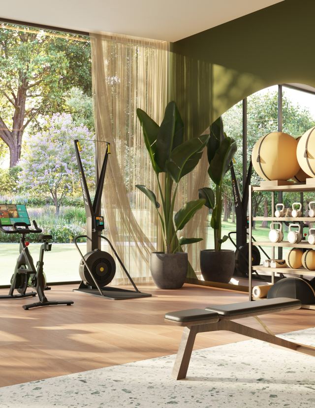 The residents' gym at The Wilds Residences looking onto greenery.