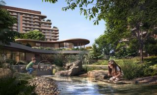 The Nest Signature Pavilion beside a stream at The Wilds.