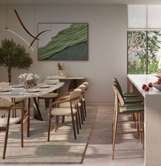 Dining room and kitchen island in a home at The Wilds, opening to the garden.