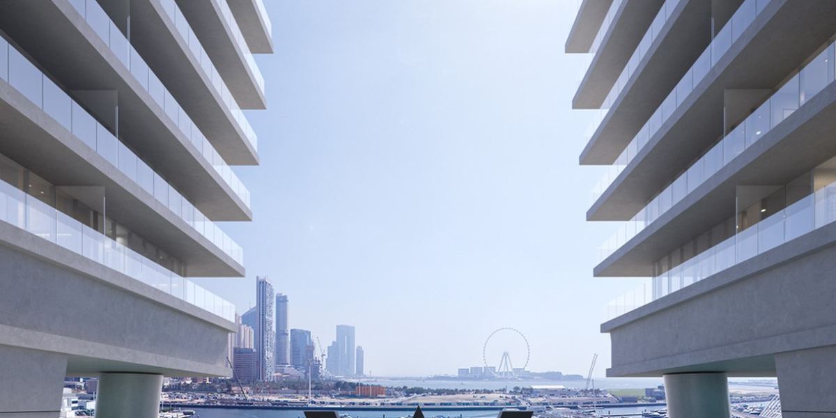 The amphitheatre between the towers at W Residences, with the W mark above the harbour.