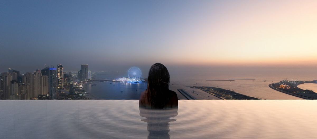 The rooftop pool at W Residences at Dubai Harbour looking over the Palm.