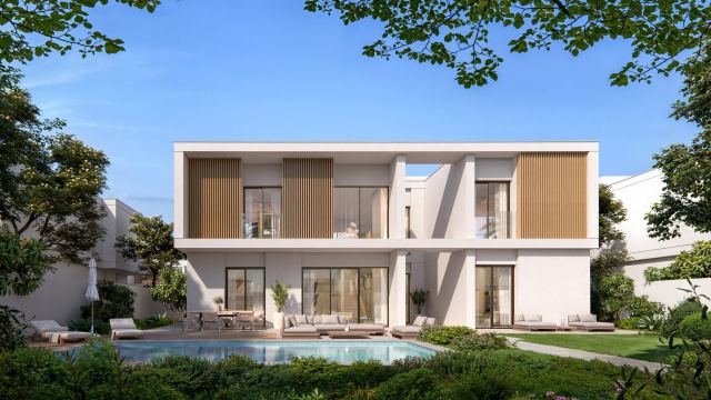 Rear garden and pool of a six-bedroom inland villa at Yas Riva Reserve