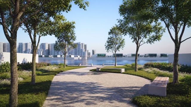 Park path leading to the canal at Yas Riva Reserve